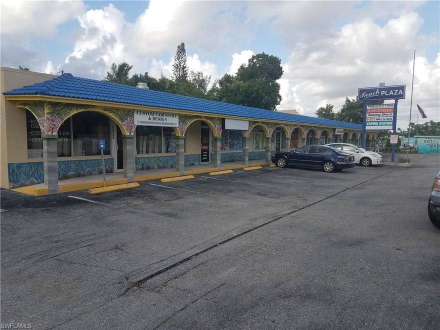 Six unit commercial directly off of Bonita Beach Road on the way to Barefoot Beach! Five of the six units are currently leased, and the sixth is currently under negotiation, so there should be no delay in obtaining rental income. Has direct water access to canal.