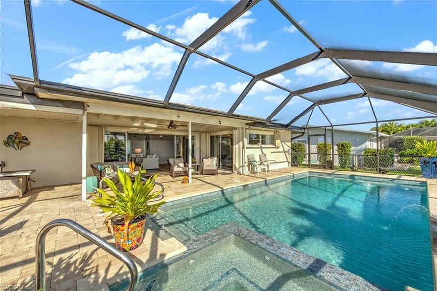 SAILBOAT- DIRECT GULF ACCESS- NO FLOOD- CORNWALLIS GEM-MOTIVATED SELLRS
This Beautiful home has it all - Salt Water Pool with Hot Tub - Wireless Remote Control. Dock with Canopy- Captains Walk -Remote Control up to 12,000 Pound lift. Commercial Grade composite deck. New Roof -2021. Fenced backyard. Brand New kitchen with white  wood cabinets and white quartz counter tops. Brand new stainless appliances with finger print guard.Electric front door accordion shutters and manual hurricane shutters. Make your appointment today - Let your Florida dream begin. Boat and furnishings negotiable.