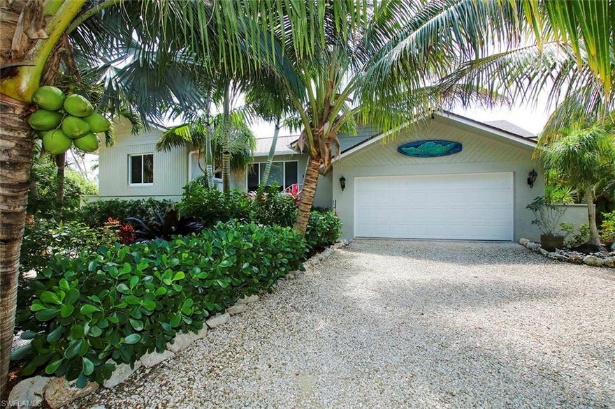 Better than new! This completely remodeled home in the sought after neighborhood of East Rocks is not to be missed. As you enter the home you will be enchanted by the vaulted ceiling and the wall of vanishing impact glass sliding doors that overlook your screened lanai,pool, spa, and the serene lake where wildlife abounds. Open living and dining areas give ample room for entertaining. The updated kitchen features granite countertops, premium stainless appliances and Shaker style cabinets with glass front upper doors. The Master Bedroom has sliders to the lanai as well as glass doors to a separate deck overlooking the lake. The Master Bathroom has as walk-in shower with a rain shower head, a double vanity with white marble counters, and white surface bowl sinks with waterfall faucets. The pool and spa have been resurfaced, and the paver pool deck provides more fun and outdoor space. Take a walk through the beautiful and landscaped yard and find more surprises. Being sold furnished