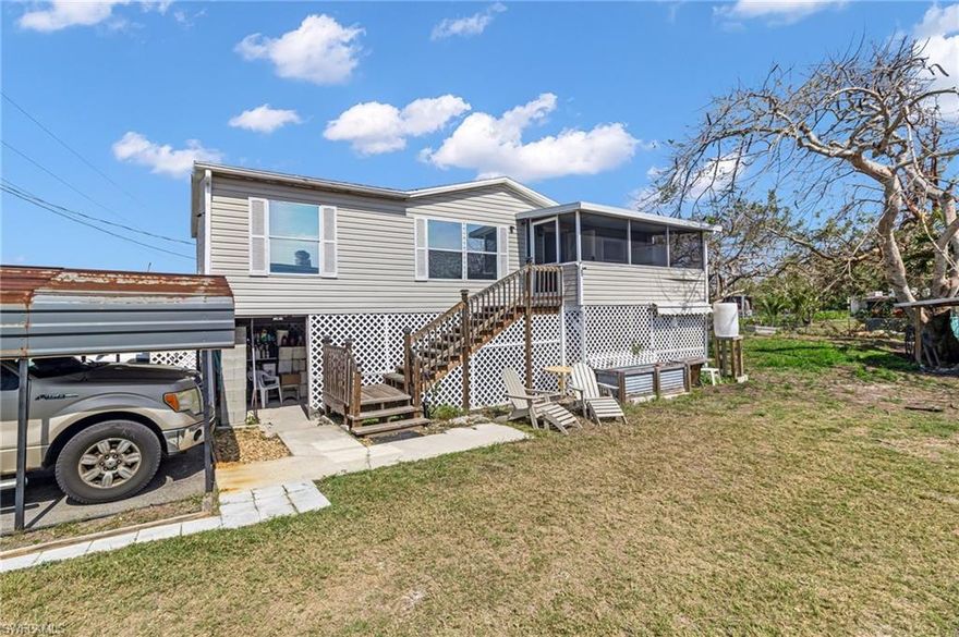 This property at 228 Mamie Street, Chokoloskee Island, Florida 34138 is an inviting and renovated home priced to sell at $349,000. It features:
 • 3 Bedrooms
 • 2 Full Bathrooms
 • 960 sq. ft. of living space
 • 0.17 Acres of land
 • Built in 1993, renovated in 2021
 • Style: One-Story Mobile Home

Interior Highlights include:
 • Kitchen with stainless steel appliances, induction stovetop, and conventional/air fry oven
 • Master Bedroom with a walk-in closet and ensuite bathroom featuring a garden tub
 • Ceramic Tile flooring throughout
 • Central A/C for cooling

Additional Features:
 • Elevated home with extra space below for storage or workshops
 • Screened porch at the entry
 • Carport and an open backyard
 • Three marinas within approximately 1 mile, offering easy access for boating, kayaking, or canoeing, perfect for nature lovers or fishing enthusiasts.

With its recent updates and access to the serene Everglades, this could be a fantastic home, vacation getaway or seasonal rental property.