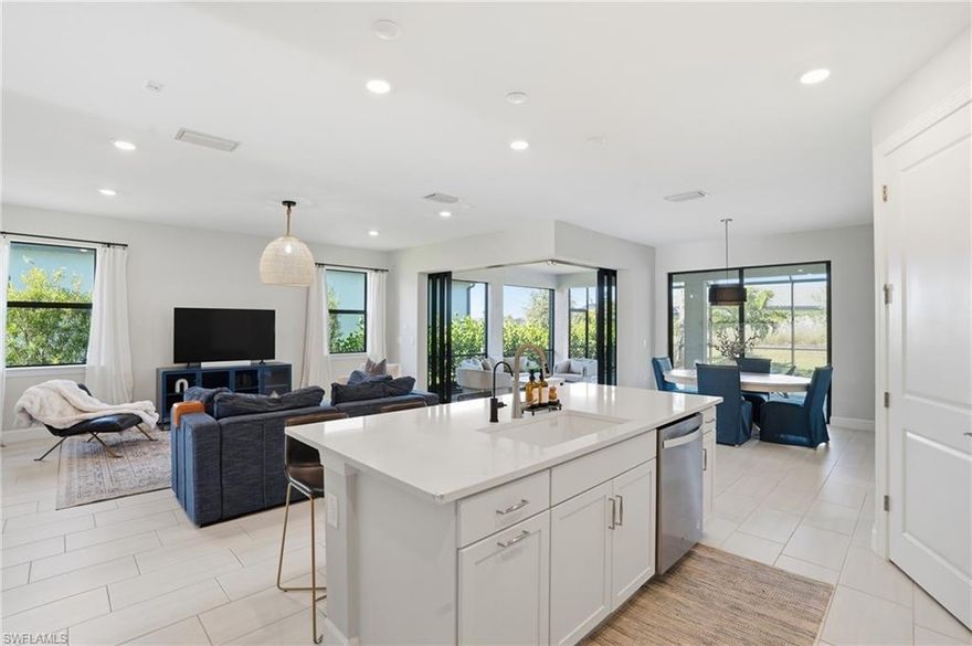 Popular "Mystique" floor plan offering three bedrooms plus an enclosed den and two full baths, now available Partially Furnished with a modern twist! Thoughtfully designed and move-in ready, this home blends comfort, style, and privacy in one of the area’s most sought-after resort communities. Recently added whole house water filtration system and reverse osmosis system! The open-concept living space is enhanced by sliders in the dining area, flooding the home with natural light and creating a seamless indoor-outdoor flow. The kitchen and living areas are ideal for both everyday living and entertaining, while the enclosed den provides flexible space for a home office, media room, or guest retreat. Step outside to the private lanai, where lush, mature landscaping creates an exceptionally secluded setting—perfect for relaxing or entertaining accompanied with a salt water heated gas pool. Outdoor furniture is included, allowing you to immediately enjoy Florida living at its finest. Beyond the home, residents enjoy access to a grand, resort-style clubhouse featuring a full-service restaurant and bar, Olive & Thyme, ideal for casual dining or social gatherings without ever leaving the community. The 15,000 sqft amenity campus also includes a resort pool and spa, state-of-the-art fitness center, aerobics studio, tennis, pickleball, dog parks and playground. A full calendar of events and activities creates an engaging, vibrant lifestyle year-round.