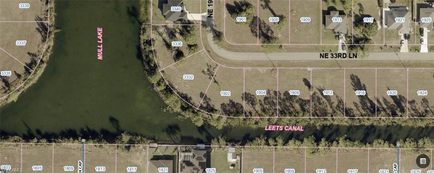 Oversized waterfront lot located on an extra-wide freshwater canal in desirable NE Cape Coral. This property offers beautiful water views and added privacy, perfect for building your dream home with plenty of space for a pool and outdoor living area. Enjoy freshwater canal access ideal for kayaking, fishing, and relaxing right from your backyard. Situated in a growing area with newer homes and convenient access to shopping, dining, schools, and main roadways. Great opportunity to build now or invest in one of Cape Coral’s expanding neighborhoods.