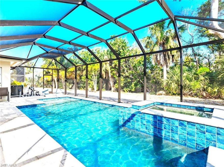 Renovated beach house with tropical private backyard views of Matanzas Pass Preserve, which includes a peek-a-boo view of the Matanzas Bay in your backyard and a short walk to the beach. This tropical paradise was fully renovated in 2023, which includes a newly-built fully-automated inground pool and hot tub with screened-in pool cage plus a pool alarm system for your safety. This like-new 2 bedroom plus den beach house is only 1.8 miles to famous Fort Myers Beach Times Square, which offers loads of restaurants & entertainment. Publix Grocery, Snook Bight Marina (for all your boating needs) and the delicious Junkanoo Waterfront restaurant is only 1.5 miles away. Renovation includes all new hurricane impact windows/doors plus an updated kitchen with new Samsung White Glass appliances. Your great room screams a tropical vibe with floor to ceiling windows overlooking your private backyard oasis. Spacious master bedroom offers a master bathroom with a walk-in tiled shower. The 2nd full bath has an updated walk-in tiled shower with glass shower door. All new lighting fixtures and ceiling fans, new window treatments. New front screened-in Lanai perfect for grilling & relaxing. Second bedroom overlooks the pool and preserve. There is a small covered carport in the front for a Golf Cart plus an attached storage area (11.8x10.6) off the kitchen that leads to the pool. Enjoy this peaceful, tranquil setting in this quiet monthly zone on a dead-end road. Welcome to Shell Mound Subdivision with beach access.