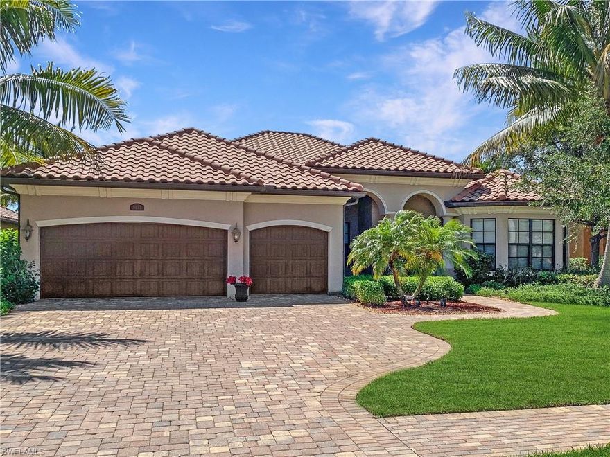 The only home for sale on one of the most desirable streets in Treviso Bay. Italia Way is a quiet brick-paved street lined with palms & walking distance to the resort club! This four-bedroom, plus den, Portofino model pool home has it all. Everything from the three-car garage to a large master suite w/sitting area. Countless upgrades including brick pavers around the luxury pool & spa w/water features, covered outdoor kitchen, lanai wood ceiling inlay, diagonal tile, crown molding, tray ceilings, granite counters throughout, stainless steel appliances, 42-inch dark brown nutmeg cabinets in the kitchen. Multiple dining areas: formal dining room, breakfast bar, & breakfast nook. Separate guest on-suite w/pool bath is in the rear of the home. Conveniently located near the Villa Rilassare clubhouse. Treviso Bay is the only TPC 18 hole golf course in SWFL. Other amenities include 8 clay tennis courts, full-service gym, aerobics, pickleball, full-service resort-style pool and a tiki bar, a guarded front gate, beautiful walking paths, and a boardwalk through the nature preserves.