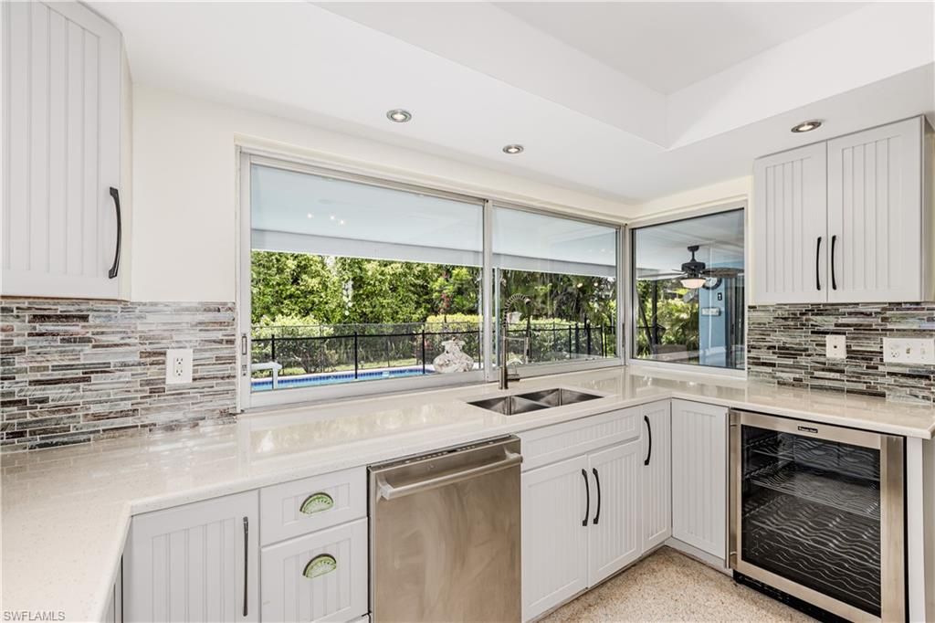 Photo of 211 W Flamingo CIR, MARCO ISLAND, FL 34145 (MLS # 226013818)