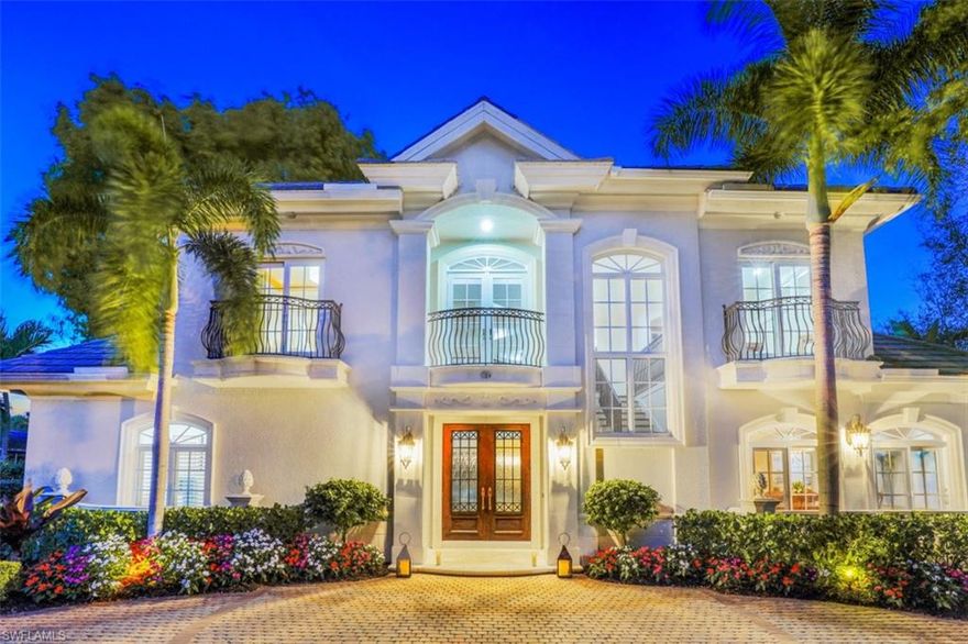H4418  Paradise found! No need to scramble for a parking spot, this home is located only 3 BLOCKS from the gorgeous beaches of Naples, & the crystal blue waters of the Gulf of Mexico! Stroll 5 BLOCKS SOUTH, and you're at the world class shops & dining of 5th AVE S. This magnificent 2-story 3 bedroom + den home with custom finishes, provides a luxury lifestyle people come to Naples to find. The circular paved driveway & meticulous landscaping adds to the beautiful curb appeal of this manor-style home. Enter through the custom front doors of 33 3rd St and take in the grand but yet cozy "great room" with views of the pool and tropical terrace. The ground floor Owner's Suite has two walk in closets and a luxurious Master Bath. For the "chef" there's a large gourmet kitchen with high-quality appliances, including a gas stove top, as well as an OUTDOOR KITCHEN for the "grill-master" of the house! Plenty of room for entertaining! When not soaking up our Florida sunshine at the beach, enjoy your heated pool and spa in your own private backyard oasis. The large two car attached garage enters off of a side alley. This home has a light neutral palette, is impeccably maintained, and a delight to show.