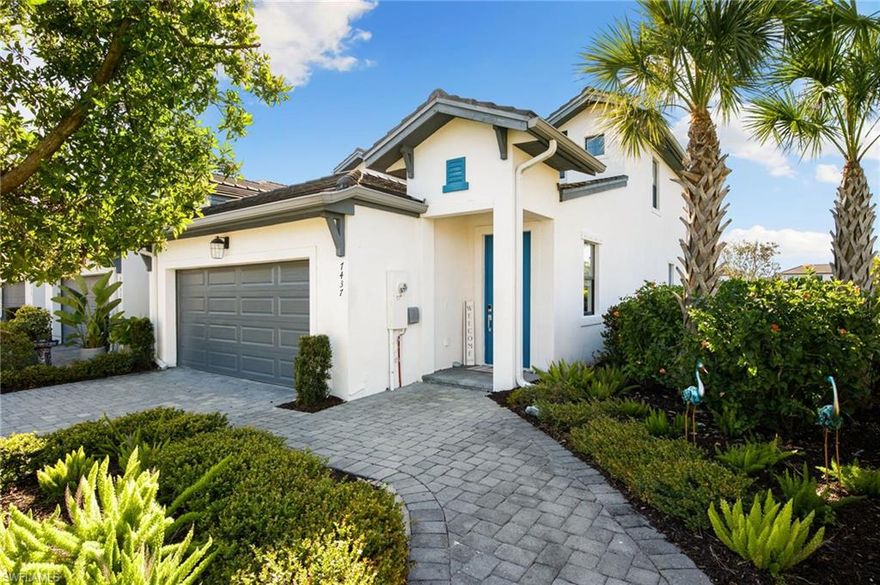 Welcome to 7437 Rockefeller Drive in the gated community of Vanderbilt Reserve—an immaculate, bright, and airy END UNIT townhouse featuring the rarely available and highly desirable Biltmore floor plan. This former model offers 3 bedrooms, 2.5 baths, 2 car garage, and a first-floor primary suite, that is carpet-free! Upgraded appliances, flooring, and lighting throughout! Gently lived in and meticulously maintained, this home is truly move-in ready. Enjoy western rear exposure with peaceful lake views and stunning sunset skies from your screened-in lanai. Ideally located just steps from the community pool, hot tub, and fitness center. Vanderbilt Reserve is perfectly positioned in prime North Naples near top-rated schools, grocery stores, dining, shopping, and Mercato—plus only 25 minutes to RSW International Airport. Low HOA fees include basic cable, WiFi, and roofs. Whether you’re looking for a primary residence, second home, or investment property, this exceptional end unit townhome checks every box!