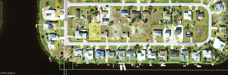 Build your dream home in one of Port Charlotte's most sought after neighborhoods! Proximity to waterways, beaches, dining, and shopping make this property ideal for your Florida lifestyle. Located on a quiet, well-maintained street that sits just across from the waterway, this lot sits in a fast-growing area surrounded by new construction, beautiful waterfront homes, and easy access to shopping, dining, schools, and the pristine beaches of Southwest Florida.  Enjoy the close proximity to Charlotte Harbor, Punta Gorda, Boca Grande, Siesta Key, Clearwater, Sanibel, Naples and Fort Myers. Enjoy nearby boating, fishing and kayaking launching at the nearby public boat ramps. Golf courses and nature parks are all within your reach. At 18235 Petoskey Key Circle, you have found Your Perfect Slice of Paradise!