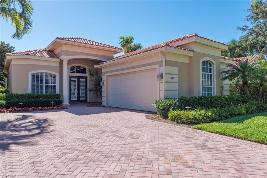 Enter this Spectacular home in Portofino with a grand entry and soaring 12 foot ceilings throughout, featuring the fabulous Great Room floor plan that is quintessential paradise living. This is the perfect layout for entertaining with surround sound and a seamless flow from room to room. The kitchen offers newer stainless appliances; double oven and Granite countertops and opens to the Great Room. Custom built home features two Master suites with generously sized closets finished with custom cabinets, flexible 3rd bedroom,  and den. Spacious pavered lanai area with a gas heated pool and raised spa, built-in outdoor grill and shutters. Rich landscaping and wonderful privacy. Property is set on the Golf course with Preferred Southern exposure. Pelican Marsh is in the heart of Naples and located minutes to sugar sand beaches, shopping, The Philharmonic Performing Arts center, and fine dining. The Pelican Marsh club includes state of the art Fitness center, Yoga, Pilates, miles of walking paths, & Tennis center. Golf memberships available but not required. Home warranty provided at closing.