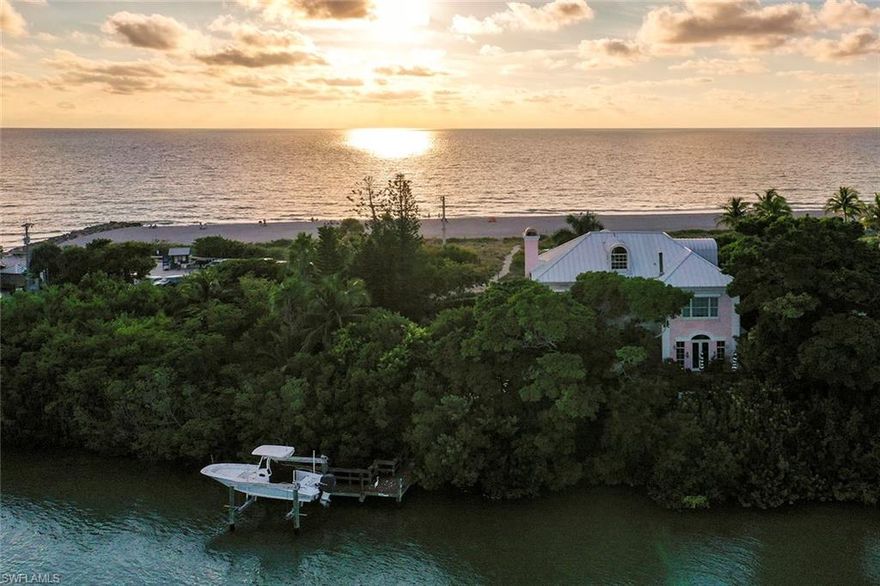 Sophisticated,charming and an incredibly exclusive Captiva Island Beach and Bay Estate. Stunning and alluring, this private home offers a gorgeous interior that includes barn wood flooring with tongue and groove and cypress beamed ceilings. Elegant kitchen area offering a walk out deck offering a brilliant setting for outside dining and relaxing with panorama views of the bay and natural wildlife surrounding. Magnificent beachfront sunsets and sunrises from the picturesque windows overlooking both the Bay and Gulf of Mexico. Private beach access to Captiva beach and a private boat dock and lift on Captiva Bayside. Arguably one of the best beach, boating  and fishing locations in SW Florida. Beautiful pool and spa setting with koi pond. Full house generator. Elevator. Private gated entry. Furnished. Living the island dream.