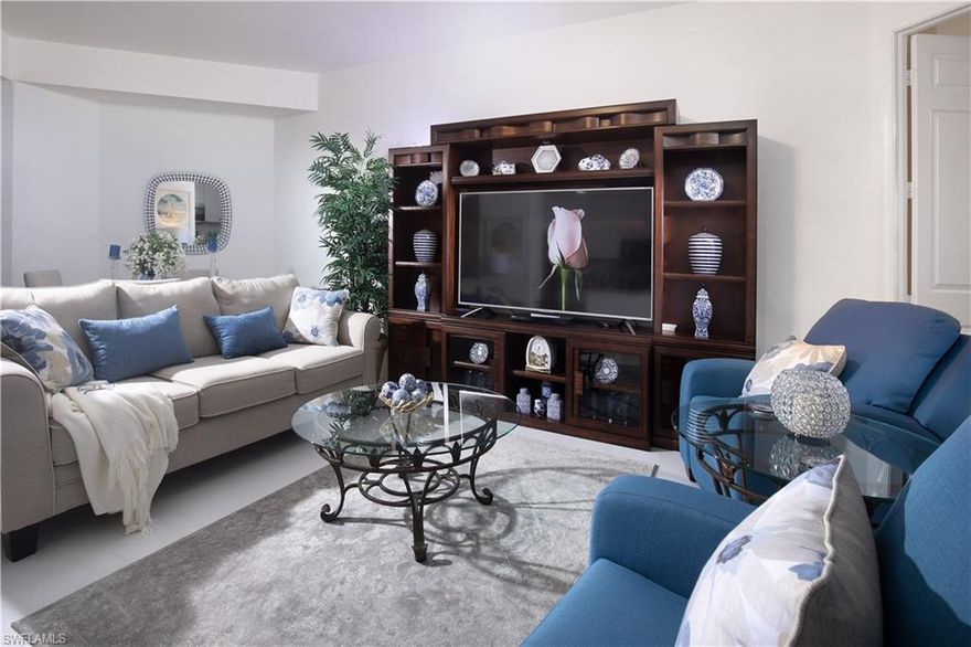 Gorgeous, light and bright END UNIT!!! This impeccable town home features beautiful open kitchen and spectacular   lake views from the screened lanai. This 3 bedroom, 2 bathroom turnkey furnished home offers an abundance of desirable features as large Brazilian counter top, stainless steel appliances,  beautiful white tile floors and elegant marble kitchen back splash.  Located in the renowned community of Fiddler's Creek, residents enjoy access to award-winning recreational amenities like spa, tennis, fitness, tropical resort-style pools, and a fine dining restaurant, a poolside bar and grill service throughout the day.Optional Golf Club membership  available and a magnificent 18-hole Arthur Hills championship golf course. Residents may  also join The Tarpon Club, including private beach access, benefits at Marco Beach Ocean Resort located on the white sand beach on Marco Island.