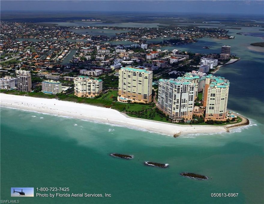 Enjoy breathtaking panoramic views of the Gulf & Marco's famous Crescent Beach .  Expansive beach terrace for outside living & entertaining.   Beautifully appointed, stunning marble floors, fine architectural details, sophisticated decor, soft & subtle colors, quality furnishings & more.  Spacious & luxurious 3 bedroom 3 bath floor plan.  Elegant living area affords 10' ceilings with full height glass to maximize beach & Gulf views.  The gourmet kitchen & morning room with striking beach views will delight the family chef.  Luxurious master suite walks out to beach terrace ,lavish master bath affords his & hers bath areas, jetted tub & huge walk-in shower and his & hers wardrobe closets.   Two privately located guest suites afford ample space for visiting family & friends.  Two new A/C systems installed July 2017.   Fabulous building& community amenities afford convenient beach access, seaside pool, spa, club rooms, billiards, fitness, bar , active social program, 6 Har Tru tennis courts, fishing boardwalk, and much more.  The perfect fit for an active Florida lifestyle all within the prestigious gated beachfront community of Cape Marco.
