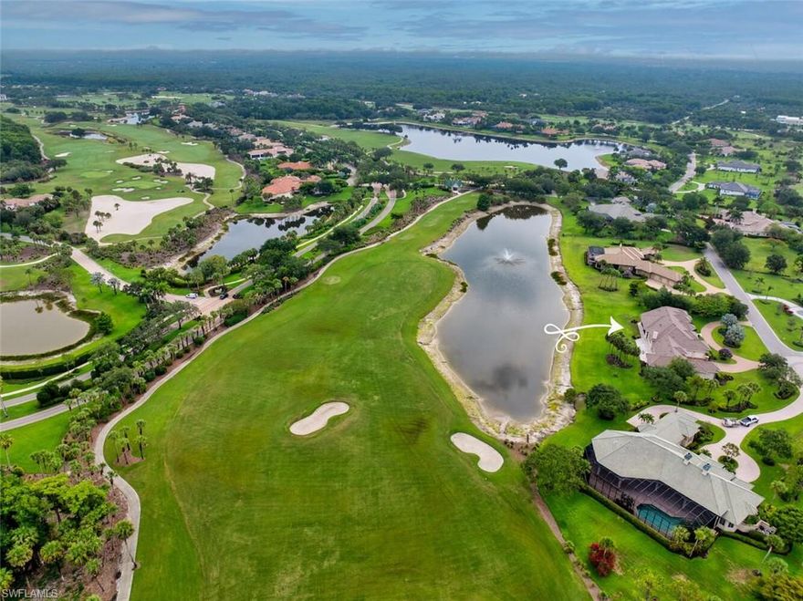 Views! Views! Views from almost every room!! A magnificently custom-designed estate, (2016), where timeless craftsmanship meets modern luxury! Showcased on one acre, overlooking the 4th fairway of Twin Eagles Golf & Country Club's revered Talon Course, this home offers sweeping views of the lake and golf course from nearly every room! An additional four acres of land extend into the water and fairway, offering an unmatched sense of privacy and space. Warm, rich wood finishes, harmonized with other materials, set the tone of refined comfort and tranquility. Mahoghany and Leaded Glass doors, stained Oak trim, crown molding and solid doors, Cherry soft-close cabinetry throughout, Travertine stone gas fireplace with twisted Juniper mantel, as well as Walnut and Marble floors define the essence and character of the home.  Encompassed in 5,493sf, this ranch-style home has a sense of casual sophistication, tailored for everyday living, as well as grand entertaining. Centered around a spacious gourmet kitchen, with gas-cooking on professional-grade Wolf appliances, including a steam oven, Sub-Zero Refrigerator/Freezer and a generous walk-in pantry, this home features 4 en-suite bedrooms, 5.5 bathrooms, a large game room with wet bar, two 2-car garages (4 bays) and 3 zoned HVAC systems, to mention a few. Upgrades include a whole house generator, hurricane impact glass throughout, plus electric shutters and screens for the oversized patio, for added comfort and security. Twin Eagles Golf & Country Club is abundant in wildlife and natural beauty. Residents often spot deer, wild turkeys and a variety of birds throughout the community. The Club offers a wide range of amenities, including golf, tennis, pickle ball, bocce, a fitness center with classes, a variety of hobbies, dining and social activities, for members to enjoy. Club membership is mandatory and the new homeowners can choose from golf, sports or social membership.