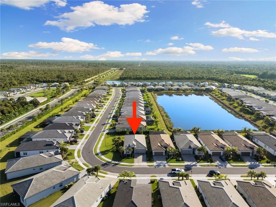 Discover refined luxury in this stunning "Sandpiper" floor plan home at 12372 Dahlia Court, located within the prestigious gated 55+ community of Valencia Trails in North Naples, Florida. Boasting approximately 1,660 square feet of elegantly appointed living space, this 2-bedroom + den, 2-full-bathroom residence offers the perfect blend of sophistication, comfort, and modern upgrades on an exceptional Southern facing corner lot. Step inside to an open, light-filled interior featuring seamless tile flooring throughout—no carpet in sight—for effortless maintenance and timeless appeal. Plantation shutters grace the windows, adding a touch of natural light to beam throughout while providing privacy and light control. All closets and cabinets have been meticulously upgraded for superior organization and style, complemented by contemporary lighting fixtures and ceiling fans that elevate every room.
The heart of the home is designed for both relaxation and entertaining, with a versatile den ideal for a home office, hobby space, or guest overflow. Enjoy peace of mind with full impact-resistant windows and doors, a whole-home Generac generator for uninterrupted power, and a smart thermostat for energy-efficient climate control.
Outside, this premium corner homesite shines with a spacious backyard nearly akin to a double lot—perfect for creating your private oasis, whether adding a custom pool, lush landscaping, or expansive outdoor living area. The oversized driveway provides ample parking, while the 2-car garage features a durable epoxy floor finish for a polished, low-maintenance space. Residents of Valencia Trails indulge in a resort-style lifestyle centered around a magnificent 43,000-square-foot clubhouse, complete with a full-service restaurant and bar, state-of-the-art fitness center, social halls, arts studios, and a vibrant calendar of events. Outdoor amenities abound, including multiple pools (resort-style, lap, and resistance), a dedicated racquet club with tennis and pickleball courts, bocce, walking trails, and more—all set amidst beautifully landscaped grounds. Conveniently located just minutes from pristine Gulf beaches, world-class dining, shopping, and golf, this home offers the ultimate in Southwest Florida living. Experience the pinnacle of active adult luxury—schedule your private showing today!