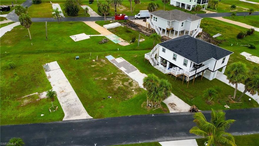 Welcome to Sunshine Village, A fantastic location to build your dream home, especially for those looking for a vibrant 55+ community in Southwest
Florida. With its attractive amenities such as a sparkling pool, clubhouse, and shuffleboard courts, along with the convenient proximity to Sanibel
Island and Fort Myers Beach, it offers a balanced lifestyle of relaxation and activity. The affordability of HOA dues at $52 per month is particularly
appealing, allowing for budget-friendly living while enjoying the communal features. The updated deed restrictions provide flexibility in designing a
home that suits your personal lifestyle and taste. Whether you're aiming for a permanent residence or a vacation retreat, Sunshine Village could be
the perfect setting to enjoy coastal living at its best. The combination of its prime location, appealing amenities, and inviting community
atmosphere makes it a desirable place to consider for anyone looking to embrace a new chapter in their life.