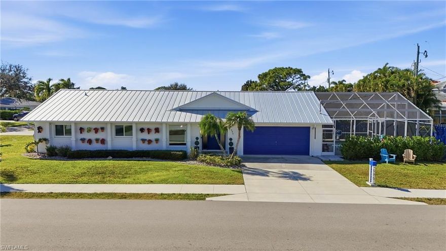 This completely remodeled, income-producing Naples Park retreat is just blocks from the beach and is offered fully TURNKEY with NO FLOOD INSURANCE REQUIRED!! The 3 bedroom, 2.5-bath home sits on a corner lot and is truly move-in or rent-ready with zero setup required.

Designed for effortless coastal living, the home features a heated pool, new 2025 pool paver deck, new 2025 Rheem pool heater, outdoor kitchen, outdoor shower, SONOS outdoor speakers, and custom RGBW lanai lighting—ideal for entertaining day or night. Impact windows and sliders throughout provide peace of mind and energy efficiency.

Major improvements include a 2025 metal roof and a 2024 3.5-ton A/C system. Inside, enjoy a game room with wet bar, perfect for hosting or enhancing rental appeal, along with a garage laundry room for added convenience.

Located just 0.75 miles to Wiggins Pass Beach and 1.15 miles to Vanderbilt Beach, this property delivers the best of Naples Park living.

Fully furnished. Income-ready. Close to the Beach. A rare opportunity to own a true turnkey home in one of Naples’ most desirable neighborhoods.