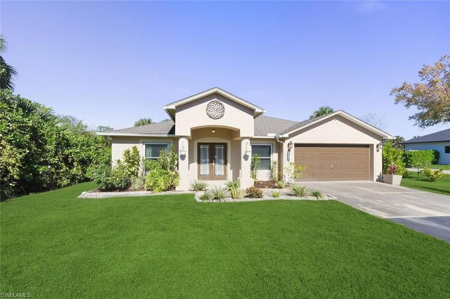 Enjoy privacy and space with this beautiful home set on 1.59 acres, with plenty of room to add a pool. The home offers 3 bedrooms, 2 baths and 2 car garage, a foyer entry, impact -resistant windows, solid concrete block construction, and a combination of tile and wood flooring. Partially furnished and featuring a screened lanai, ideal for relaxing or entertaining. ADT surveillance system. Perfect balance and convenience, just minutes from the Plaza at Everglades Blvd., with easy access to groceries stores, shopping, dining, and everyday essentials, all while maintaining the spacious, peaceful lifestyle Golden Gate Estates is known for.