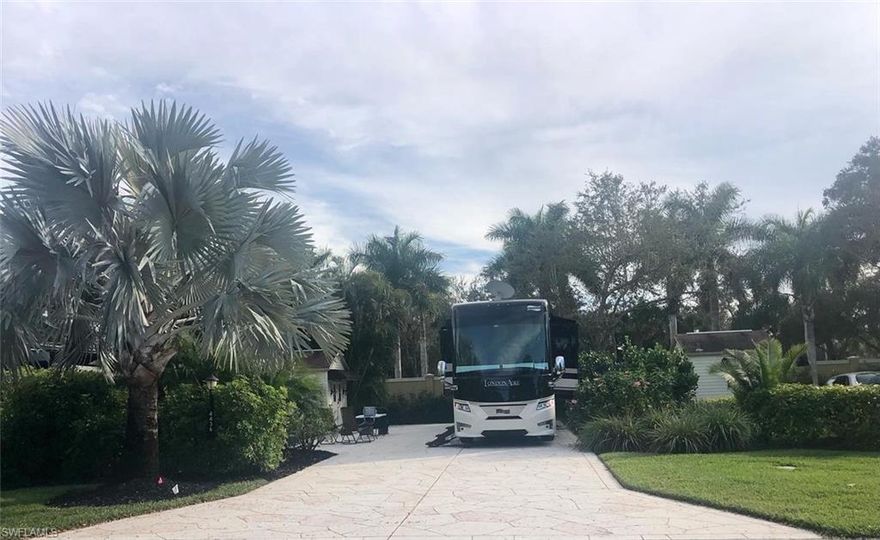 Motorcoach Site Description:  Only off-lake site available for sale in Pelican Lake currently!  This is a back-in site with northern exposure creating nice shade on the patio side.  The site is finished with a decorative etched driveway and has tasteful landscaping surrounding the property.  Do not miss this one!  Contact us for more information or to schedule a showing.
Coachhouse: This coachhouse is a 10x10 that is finished and waiting for your own idea.  It includes toilet, sink with vanity, and washer & dryer hookups.  All walls and floor are finished.