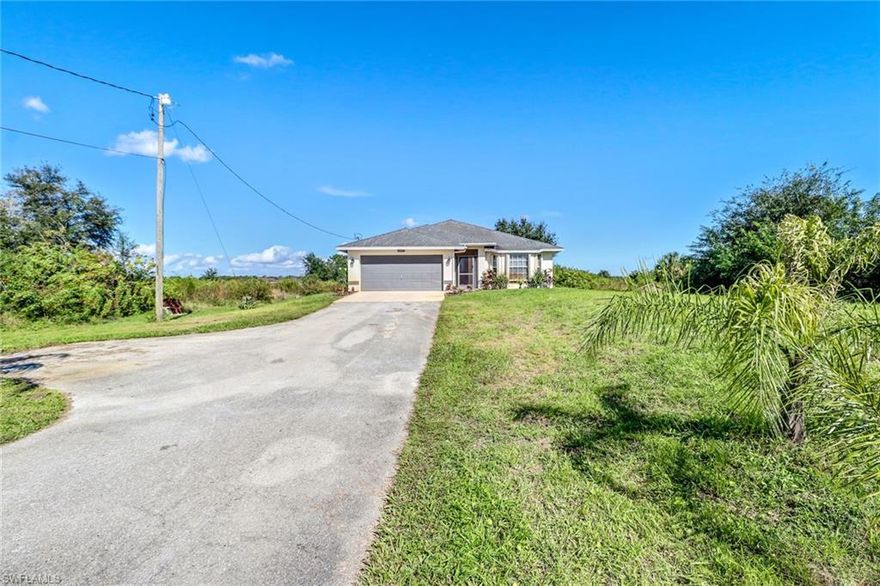 This is a Beautiful 2005 Concrete 4 Bedroom/2 Bath with Large Tile throughout the Living area and Wood Flooring in Bedrooms. This home was Updates include Granite Kitchen Countertops, Upgraded Wooden Kitchen Cabinetry, Wood Flooring in Bedroom, Alarm System, Tiled Lanai, Fenced yard, Accordion Hurricane Shutters throughout entire home, New A/C systems installed approximately 3 years ago, Sprinkler System, New Landscaping, Newer Refrigerator/Ice-maker, Water conditioner tank replaced March 2016 (1800.00), Microwave replaced Jan 2016 (600.00), Pump Controller board replaced March 2017 (150.00), Garbage Disposal is brand New. Ceiling Fans Jan 2016 (60.00 each), Transferable well service contract 50.00 months. ADT security system for the house, just not in use Washer and Dryer Hookups, the refrigerator in the garage does not stay. Home is located 2 streets from Randall Blvd. Close to the new Publix's Store. Please, see confidential Remarks!!