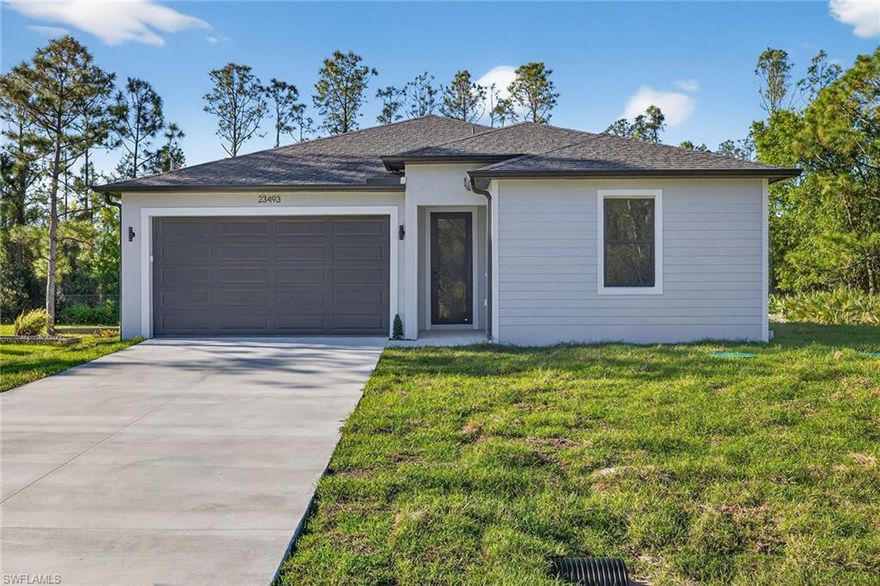 Step into refined modern living with this stunning brand-new 2026 construction home, thoughtfully designed to blend elegance, comfort, and functionality. From the moment you enter, you’re welcomed by soaring 10’4” tray ceilings that create an airy, grand ambiance throughout the main living spaces. The home showcases sleek glass tile flooring throughout, offering both sophistication and easy maintenance. Every detail has been carefully selected, including elegant designer hardware that adds a polished touch to every room. The spacious layout features 4 generously sized bedrooms and 2 beautifully appointed bathrooms, providing ample space for both family living and entertaining. The heart of the home is complemented by a modern kitchen equipped with stainless steel appliances, perfect for both everyday use and hosting gatherings. Built for both style and peace of mind, the property includes high-impact windows, as well as a double-car garage for convenience and storage. Situated on a ¼-acre lot, the home offers plenty of outdoor space with room to relax, garden, or customize to your lifestyle. Located in a quiet, peaceful neighborhood, this property combines tranquility with accessibility—just minutes from the Charlotte County Sheriff’s Department and only 5 minutes to I-75, making commuting and daily errands effortless. This exceptional home is a perfect blend of modern luxury and practical living—an opportunity not to be missed.