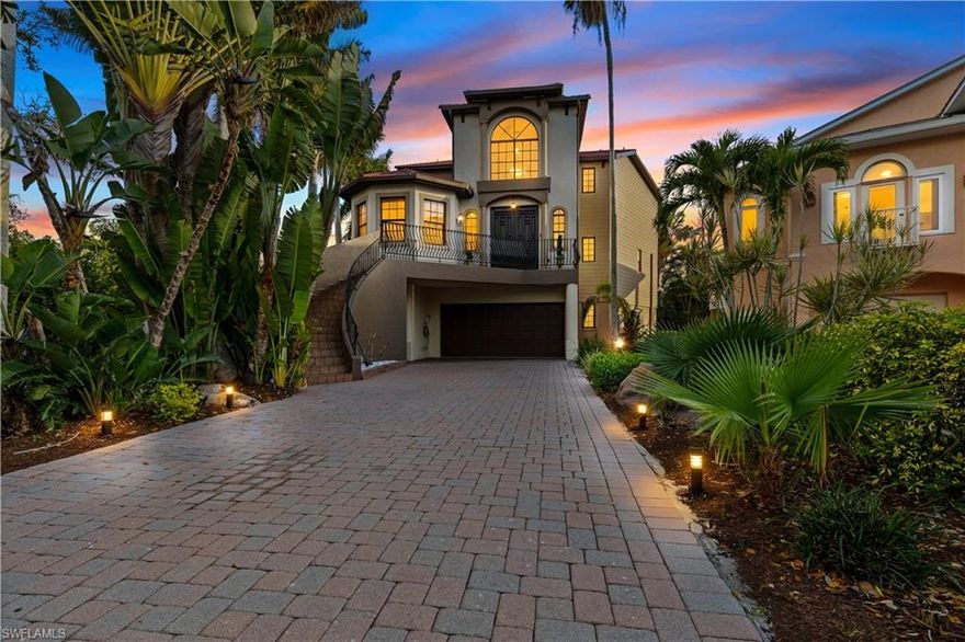 Set at the end of a quiet cul-de-sac within the exclusive gated waterfront enclave of Hawks Harbor, this elegant coastal residence captures the essence of refined Florida living. Surrounded by lush tropical landscaping and tranquil water views, the home offers an exceptional blend of privacy, luxury, and boating convenience.

Thoughtfully designed to maximize its elevated vantage point, the residence features three bedrooms and three baths, with the main living spaces positioned on the upper level to fully embrace the surrounding scenery.The home also features a private elevator servicing all levels, from the ground floor to the top, offering convenience for carrying groceries or giving your legs a break after a busy day. Expansive windows fill the home with natural light while framing picturesque views of the water and swaying palms. The open-concept living, dining, and kitchen areas create a bright and inviting setting ideal for both everyday living and sophisticated entertaining. 

The home is equipped with a Sonos surround sound home theater and a whole-home audio system for seamless music throughout.

Step outside to your own private waterfront retreat, where lush tropical landscaping creates a resort-like atmosphere. The beautifully refinished pool (2022) is complemented by a fully equipped outdoor kitchen, providing the perfect setting for hosting gatherings or enjoying relaxing Florida evenings poolside.

For boating enthusiasts, the property offers direct Sarasota Bay access and features a new 80-foot dock (2022) along with a fully covered 16,000-lb boat lift (2022)—providing both protection for your vessel and effortless access to the open waters of the bay and beyond.

Additional upgrades include new central air conditioning systems installed in 2025, ensuring modern comfort and efficiency throughout the home.

Conveniently located just 3.2 miles from Sarasota-Bradenton International Airport, the home offers easy travel access while maintaining the privacy and serenity of one of the area’s most desirable gated waterfront communities.

An exceptional opportunity to experience the beauty of coastal living in one of Bradenton’s premier waterfront neighborhoods.