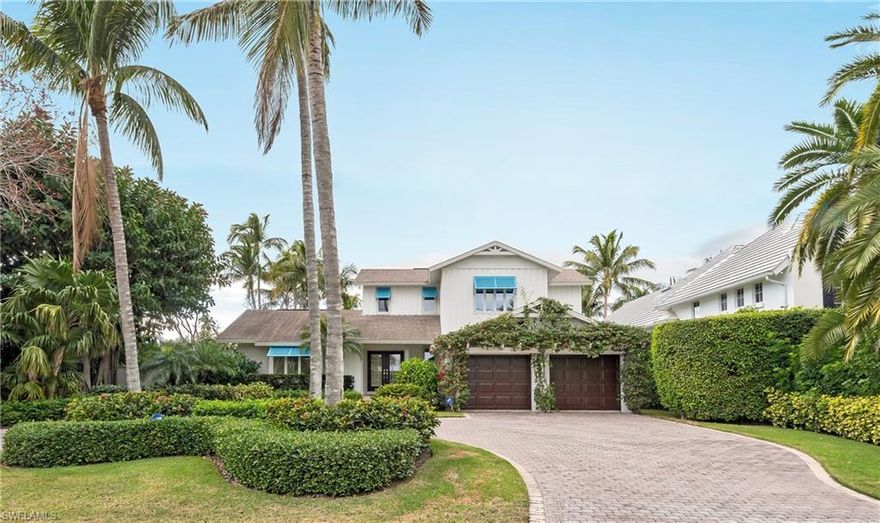 This inviting western exposure waterfront cottage is ideally located in the coveted Aqualane Shores. The home has been freshly painted and newly renovated yet still retains character and charm. The expansive kitchen boasts center island with seating, vaulted ceiling, Wolf sub zero appliances, herringbone tile floor, and decorative lighting. The living room has a cathedral ceiling, brick surround fireplace and built-in entertainment feature, the space is shared with the dining room, which looks out at the expansive deck through several sets of glass French doors. The patio space is complete with heated pool, hot tub and ample privacy with gorgeous views of Florida’s sunsets. Included is a 85 ft boat dock on a canal that leads directly out to Naples Bay. The master suite is on the 1st floor with views of the pool, the master bath has been totally remastered with LED vanity mirrors, custom light fittings, new glassed-in shower and Rohl faucets. Upstairs guest suites offer both luxury and comfort with ceiling fans, en suite baths, and plenty of natural light. The landscaping is professional and meticulously maintained. It is a short stroll to Third Street South and the beaches.