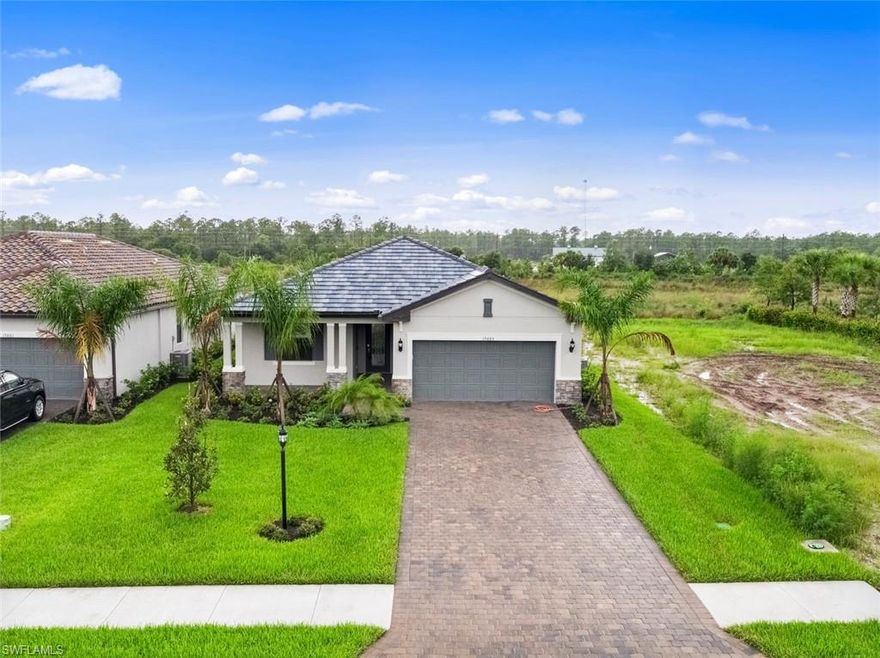WELCOME HOME! Beautiful Venice model from Lennar, with tons of options and upgrades is move in ready, and waiting for it's next owner. Conveniently located directly across the street from the clubhouse and pool, you will find this gorgeous, 3 bedroom, 3 full bath, Southern rear facing home. Why wait 8 months to get a new one built, when this one was ONLY finished in March of this year! The Place at Corkscrew offers a lot for only $312/month hoa fees, with full lawn maintenance included, 24/7 manned security gates, full service restaurant on property, resort style pool, hot tub, dog park, pickleball courts, cafe,  fitness room, yoga room, spa, and much much more! Lowest priced home in the entire community, and will not last long!