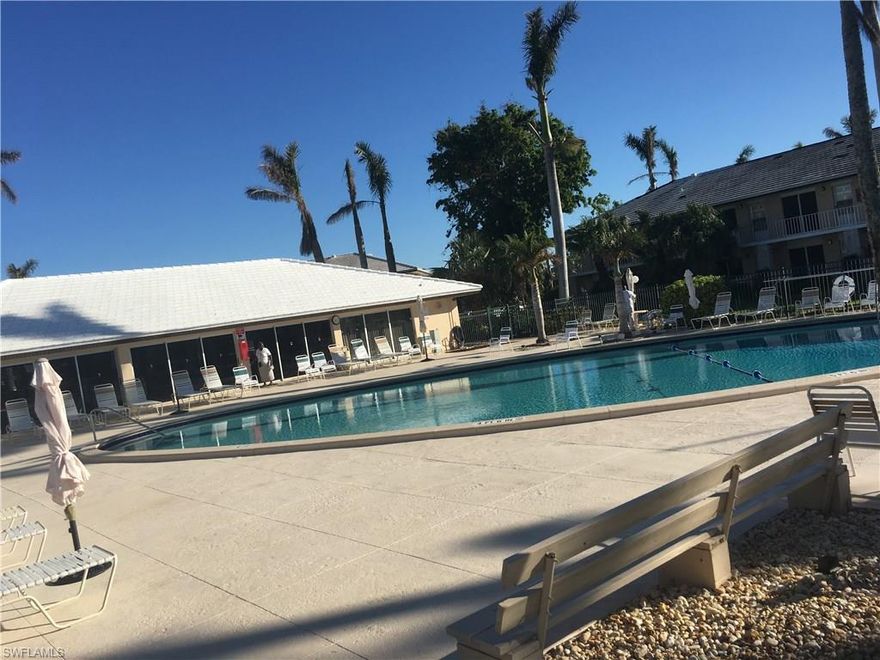 Steps to Residence Beach and restaurants. Affordable living with this floor unit. Beautiful pool, community room, laundry and extra storage. Being sold "As Is".