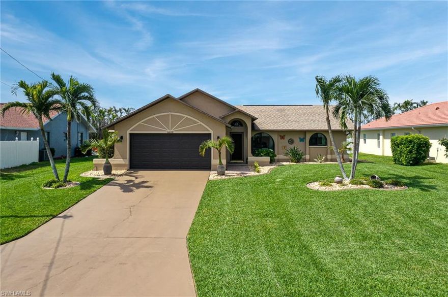 Welcome to your beautifully upgraded 3/2 home located in highly desirable SW Cape Coral- just 2.5 mi to Cape Harbour & 4 mi to downtown Cape. The exterior features a paver walkway and attractive landscaping. The home boasts a light & bright open concept floorplan with vaulted ceilings. Newly renovated kitchen w/ skylight, level 4 ocean beige granite countertops, GE Profile appliances & KraftMaid cabinets. The pass-through window to the lanai makes entertaining easy! Tile flooring in common areas and guest bedrooms and laminate in the primary. Stay comfortable year-round with a 2 yr old 18 SEER A/C unit, hurricane windows & sliding doors, and hurricane impact garage door (2021). The 2019 built pool features a paver deck, oversized heater, fountains & sauna bubblers, clear view pool cage with super screen, and curtains for privacy. The home is equipped with hi-tech features such as a Bluetooth automated thermostat, irrigation & appliances. New mulch just put down with an area pre-wired for an outdoor kitchen. An amazing vacation rental opportunity or full-time residence w/ upgraded features & prime location. Don't miss out on the opportunity to own this beautiful home!
