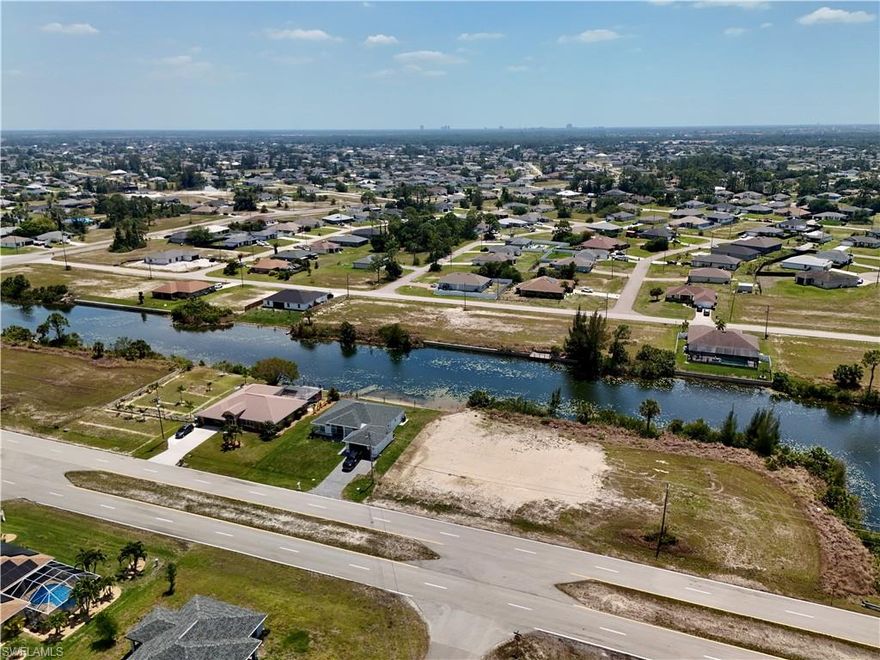 Prime waterfront opportunity! This 0.23-acre vacant lot located in Cape Coral offers direct access to a freshwater canal, perfect for enjoying serene water views and a relaxed Florida lifestyle. Ideal for building your dream home or investment property, this parcel provides ample space and a desirable setting for outdoor living. Conveniently situated near shopping, dining, schools, and major roadways, while still offering peace and privacy. Don’t miss the chance to own a slice of waterfront paradise in one of Cape Coral’s growing areas!