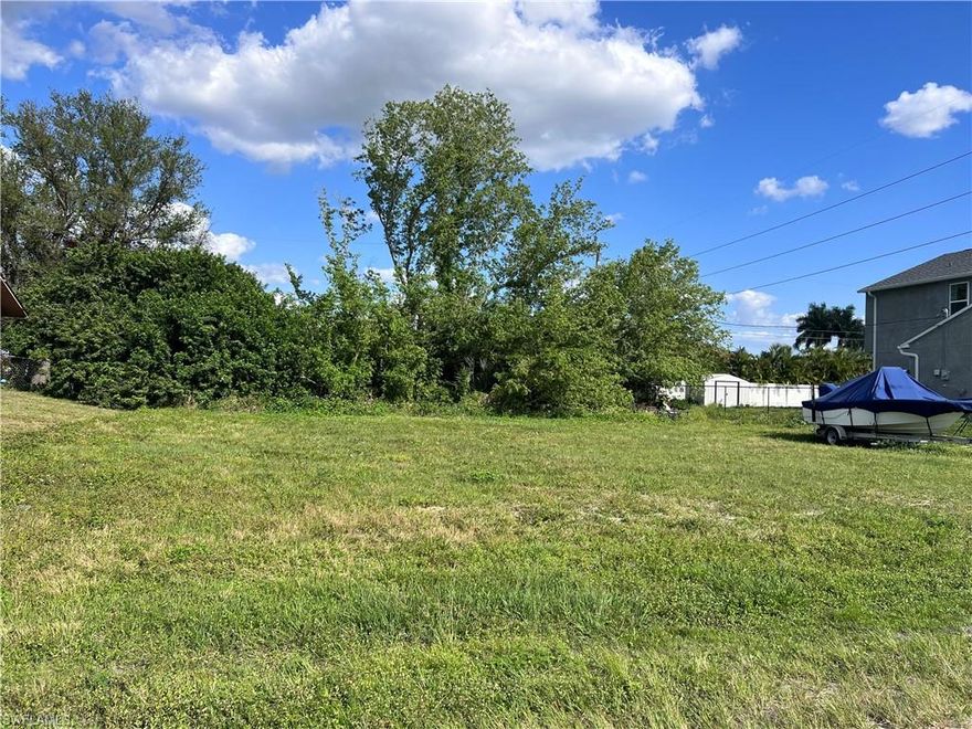 Welcome to Southwest Florida! Build your new home on this lot in a growing neighborhood! Northeast cape coral has easy access to Punta Gorda and Fort Myers. Cape Coral Utilities not expected till 2035 - see attached Utility expansion map from the City of Cape Coral. No water or sewer bill for years to come. 
Don't wait - call today to secure your investment in growing Florida.