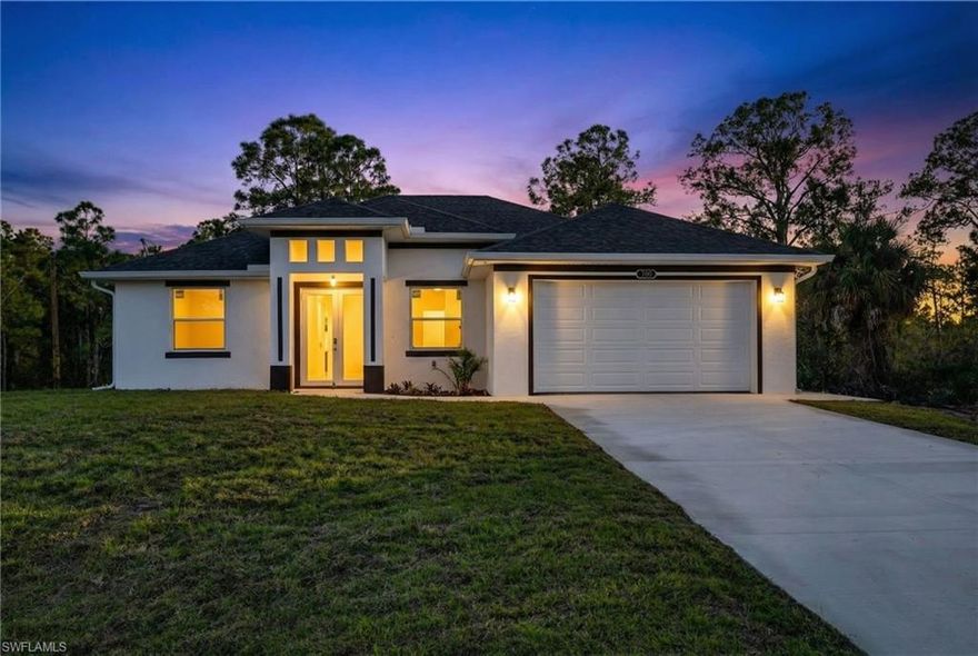Brand new construction home built in 2026 and situated on an oversized lot in a quiet and serene area of Lehigh Acres, while still offering convenient access to major roads, shopping, dining, and schools. This thoughtfully designed 3 bedroom plus den, 2.5 bathroom home features an open and functional floor plan ideal for everyday living and entertaining.

Interior highlights include tile flooring throughout, impact resistant windows and doors, and modern finishes that give the home a clean and contemporary feel. The kitchen opens seamlessly to the main living area and offers ample cabinet space and a layout well suited for hosting or family gatherings. The primary suite provides a private retreat with a spacious layout and a well appointed bathroom. The additional bedrooms and den offer flexibility for a home office, guest space, or playroom.

Enjoy the benefits of an oversized lot with plenty of room for outdoor living, a future pool, or additional enhancements. Surrounded by newer homes and located in a peaceful setting, this brand new 2026 build offers comfort, style, and location all in one. A great opportunity to own a move in ready new construction home in Lehigh Acres.
