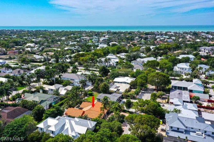 Prime Olde Naples homesite on a quiet Broad Ct S street, offering southern rear exposure and desirable "high and dry" X500 elevation. This 74’ x 115’ interior lot provides flexibility for future design and construction while allowing immediate enjoyment of the existing residence. The property’s location supports convenient access to nearby beaches, downtown shopping, dining, and cultural amenities. Alley access enhances future architectural possibilities, including garage placement and courtyard configurations. Mature landscaping and a private setting create a comfortable environment today, with fine opportunity for redevelopment. Whether planning a new residence or seeking an Olde Naples location with immediate usability, this property offers a balanced opportunity combining elevation, exposure, and neighborhood setting. Compare this lot with other Old Naples land or redevelopment offerings.