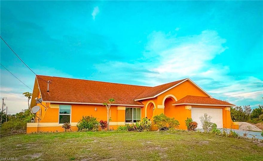 This home features 3 bedroom plus a large den that could easily be converted to a 4th bedroom, IMPACT windows, family room and living room or formal dinning if you wish, a large laundry room inside the home, great sized split bedrooms, a gorgeous kitchen with ample cabinets, granite counters and the kitchen is very open to the living area, guest rooms and bath are tucked away for privacy, the cathedral ceilings make this home feel much larger than it's footprint, you have a huge covered back porch the whole length of the home and a fenced in backyard. This layout offers so many options for the growing family. The owners have a generator they will leave that is wired up to the home.