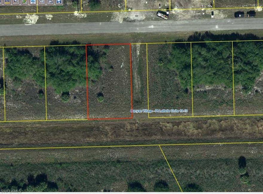 This lot sits on one of only a few freshwater canals in Banyan Village.  Additionally, there is an easement on the east side of the property which gives a nice wide open space.  There is municipal water and electric available.  This location is convenient to LaBelle, Clewiston, Moore Haven, and of course Lake Okeechobee, one of the largest freshwater lakes in the state of Florida!  Lake Okeechobee is world famous for freshwater fishing.  This would be a perfect location for a spec home.