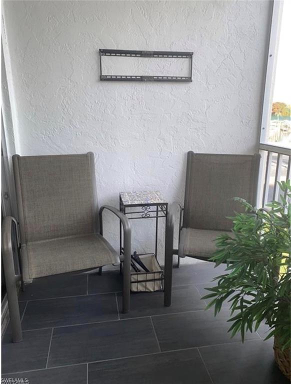 Photo of 3 Bluebill AVE #211, NAPLES, FL 34108 (MLS # 225072860)