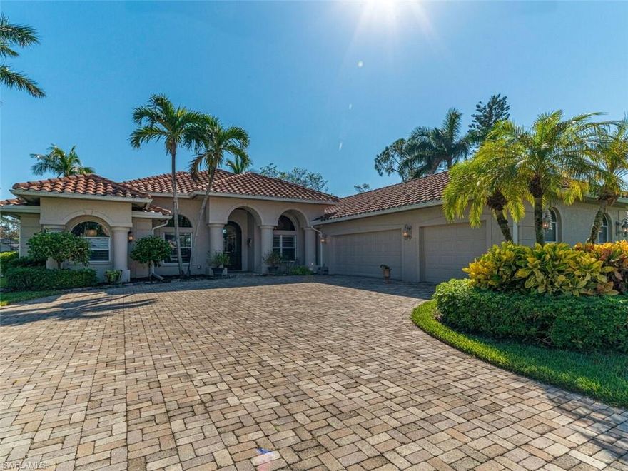 This fantastic, lakefront home in the Villages of Monterey was designed for the discerning, luxury buyer. Entering through the grand, solid mahogany front door, you’re welcomed with rich, dark wood floors, high ceilings, and an abundance of natural light. Delight in a true Chef’s kitchen with an enormous center island with a black granite leather finish counter top, boasting Jenn-Air Gourmet Series appliances including a six-burner natural gas range and additional wall oven, wine cooler, pot filler, and stunning 2-tone granite. The bonus butler’s pantry has a coffee bar and offers an abundance of storage so everything has its place away and out of sight. Enjoy the true Florida lifestyle soaking up the sunshine on your gorgeous travertine deck, floating in your freeform, salt-water pool in your fully fenced yard. The party continues after sunset, gathering around the built-in firepit on cool winter evenings. Finish off with the magic of three – 3 bedrooms, 3 newly renovated bathrooms, a 3-car garage and over 3000 sq ft of living space. New roof 2019. Hardware and fixtures from Restoration Hardware through out the home. Too much more to mention!