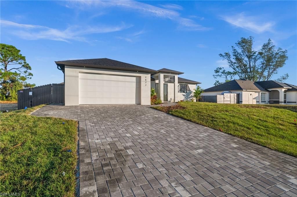 Photo of 2827 NW 13th ST, CAPE CORAL, FL 33993 (MLS # 225082919)