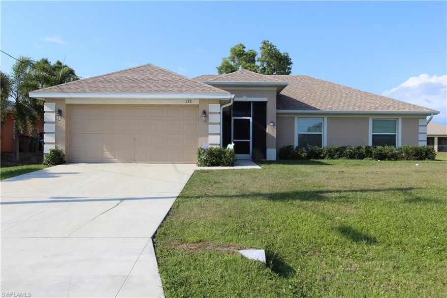 This home is a must see!  Built in 2017, this spacious 3 bedroom plus den home is ready for you and your family.  Offering a well thought out floor plan, this home is perfect for entertaining as well as enjoying a quiet night in.  You will enjoy the beautiful kitchen that has espresso cabinets, and black appliances.  The owner of the home has upgraded the flooring in all common areas to a beautiful wood-look, Coretec brand flooring.  The master suite is separated from the other bedrooms and provides a spacious walk in closet.  The master bathroom has dual sinks, and a shower with a separate garden tub.  The covered lanai is screened in and perfect for back-yard grilling.  The owner recently added a perimeter fence, providing security for pets and small children.  Schedule your appointment to see this beautiful home today!
