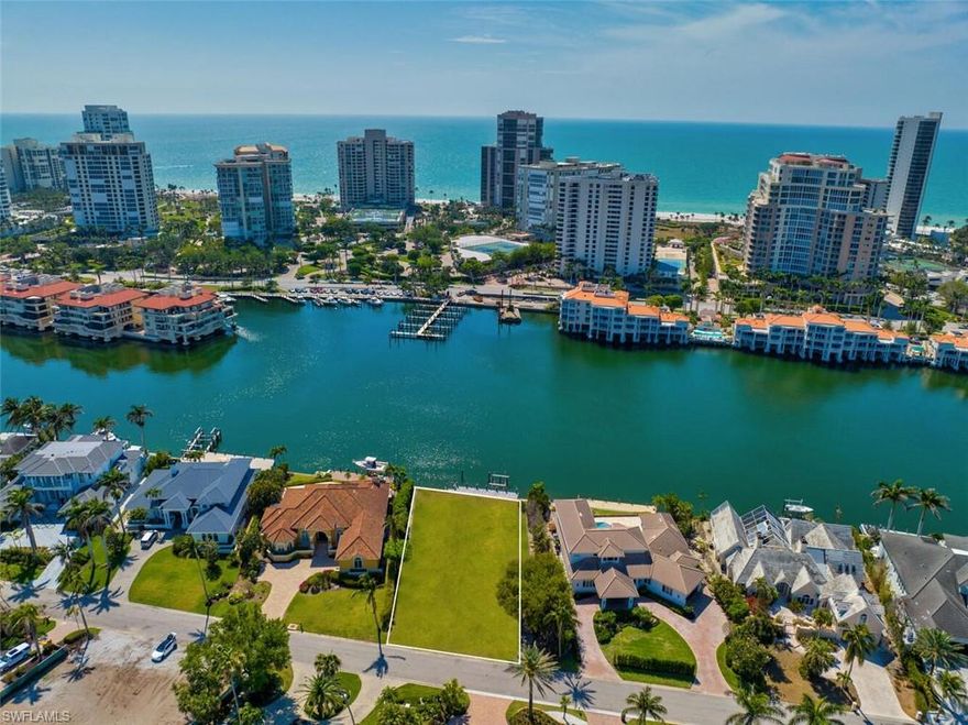 Welcome to waterfront living in Park Shore. Fabulous direct Gulf access waterfront lot. Build your dream home on this southwest lot with 105ft of unobstructed sunset views. This fabulous lot is walking distance to the Park Shore private beach entrance and the shops and dining at Venetian village and Waterside shops. A wonderful opportunity awaits....