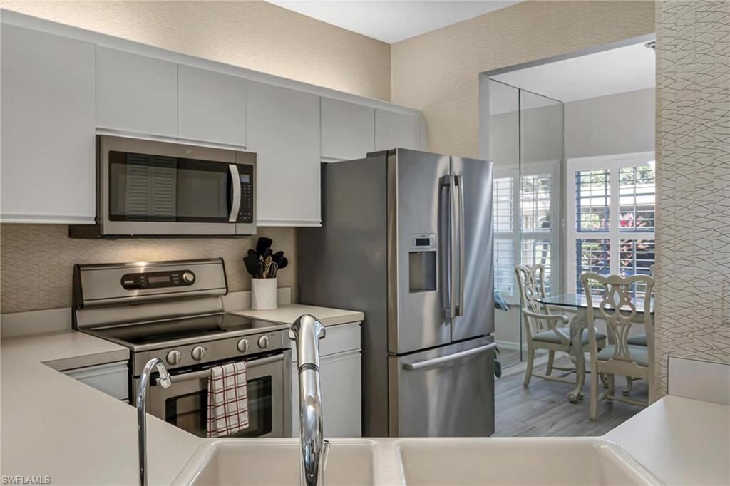 Photo of 880 Tanbark DR #101, NAPLES, FL 34108 (MLS # 223028459)