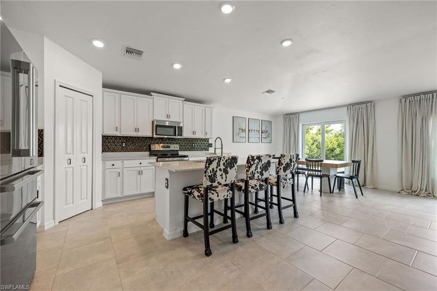 Are you searching for a truly move-in ready home? This beautifully upgraded residence in Oakview delivers with low HOA dues, no CDD fee, and a private, fully fenced backyard with peaceful lake views!

Offering 1,936 square feet, this popular Hartford split floor plan features an open-concept layout with modern finishes and upgrades throughout, well beyond builder grade! The kitchen stands out with soft-close cabinetry, a full stainless steel appliance package, a stylish backsplash, pantry, and a large island with additional seating, perfect for everyday living and entertaining. It opens seamlessly to the bright and inviting family room, filled with natural light from every angle. Agents: please read confidential remarks!

The owner’s suite offers dual sinks, a spacious shower with tempered glass door, and an oversized walk-in closet. Three additional bedrooms provide flexibility for guests, family members, or a dedicated office if desired.

Recent upgrades include hardware (2024), backsplash (2024), tempered glass shower doors in both bathrooms (2024), GE refrigerator and dishwasher (2025), luxury vinyl plank flooring in all bedrooms and closets (2025 to 2026), GE washer and dryer (2026), added laundry room cabinetry (2026), epoxy coated garage floor (2026), fresh interior paint (2026), a 12 by 12 paver patio (2026), and a professionally power washed exterior and driveway (April 2026).

Conveniently located with easy access to State Road 80, you are just minutes from shopping, dining, and entertainment while still enjoying a peaceful neighborhood setting. HOA dues include high speed internet and lawn care, adding even more value and convenience!

You can move right in and start enjoying it from day one. Schedule your private showing today and see everything this home has to offer!