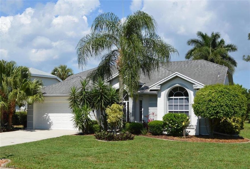 Prestigious Berkshire Lakes neighborhood with $20/mo HOA fees! Immaculate, remodeled and updated, this open floor plan with 3 bedrooms, 2 full baths, tile floors, large 30' x 12' pool with a screened lanai is a must see. Beautiful and bright throughout, the remodeled kitchen is complete with breakfast bar, pantry, granite island, Corian countertops, whole house water filtration system and newer high end appliances. Spacious vaulted ceilings and ceiling fans in every room with custom window treatments. 8' grand sliding patio doors in the kitchen, great room and master bedroom lead to the lanai. Two full baths with granite, the master bath features a large walk in shower, jetted tub, double sinks and premium custom walk-in closet. Freshly painted inside and out. True two car garage is complete with new opener and storage galore. Inside laundry with washer and dryer included. The roof was replaced in 2009 and the A/C replaced in 2010. New lawn with professionally landscaped private yard. This quiet and peaceful neighborhood has shopping and restaurants nearby. Easy access to heated community pool, club house, two tennis courts and steps away from paved walking/bike trails and lakes.