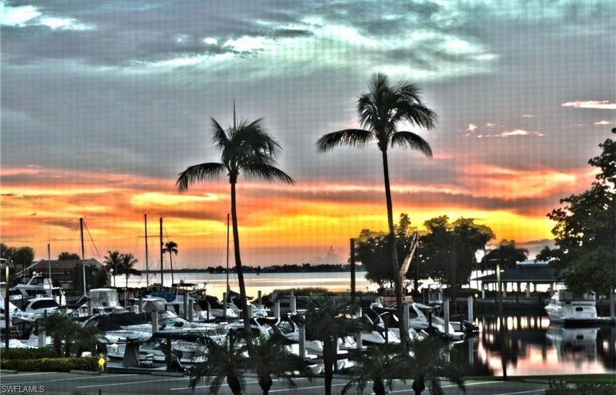 Views of River & Marina at this price! This is an amazing and RARE find! This is a must see condo for anyone who wants to enjoy the amazing sunsets in SW Florida. This 3/2 first floor end unit offers a totally updated kitchen, new stainless appliances, solid surface counters. Large tile floors, new A/C, and new washer and dryer and hurricane shutters.  The additional storage is a fabulous feature. Property is being offered  "Turnkey" with quality furniture.  The amazing low fees, and is convenient to marina (walk right out your back door) make this a very desirable property and steps to community pool.   Community offers golf, tennis, lap pool, fitness center, pickle-ball, bocce ball, 2 restaurants and a 192 slip marina located on the Caloosahatchee River.  Community has close proximity to beaches, shopping, dining and the airport.