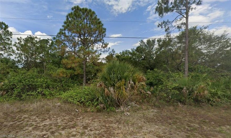 Prime oversized quarter-acre lot in a developing neighborhood of Lehigh Acres near Buckingham, surrounded by newer homes and vacant land ready for growth. This is a great opportunity for investors or future homeowners looking to get into a market with strong upside and continued expansion. Typical lot sales in the area remain affordable, while demand is driven by population growth and increasing new construction activity, making this a smart long-term hold or immediate build opportunity. The extra lot size gives you more room to design, build, and add value compared to standard parcels. Seller is open to a package deal for buyers interested in acquiring multiple adjacent lots.