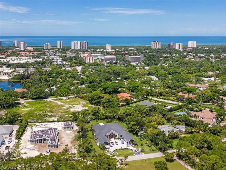 Spectacular new construction opportunity in Pine Ridge Estates! Situated on a large 1.42 acre parcel, this home has been thoughtfully drawn by JDMG Architecture to bring in as much natural light as possible, conscientiously crafted by the Glendale Group of SWFL, and beautifully appointed by Alex Zapirain Designs. Offering just over 7,200 AC sq.ft. on one level, 6 car AC garage, extra large exercise room, bonus room and 6.5 baths. The bonus and exercise rooms are en-suite for up to 6 bedrooms, if needed. Incredible great room concept with large chef-inspired kitchen and fully loaded prep-kitchen/butler's pantry.  Custom temperature-controlled walk-in wine room off the dining room provides a sophisticated choice. Phenomenal master suite with Sitting Room, morning bar, spacious master bath with separate water closets and enormous closets. Designed to take advantage of the Naples climate, the inviting outdoor living space offers a sensational kitchen, built-in bar and entertainment/sitting areas with fireplace.  Generous deck spaces and a resort-style pool with spa and sun shelf extending out to a custom fire-pit area. Completion scheduled for October 2022.