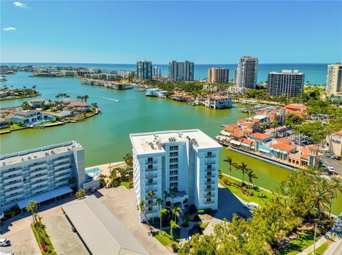 Photo of 250 Park Shore DR #302, NAPLES, FL 34103 (MLS # 223078759)