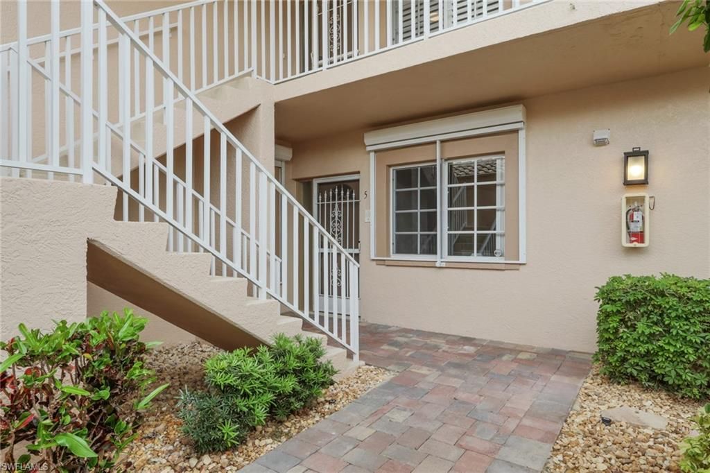 Photo of 9035 Michael CIR #5, NAPLES, FL 34113 (MLS # 225082773)