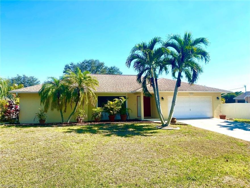 Come take a look at this charming SW Cape Coral pool home.  This 3 bedroom/2 bath home features an open floor plan with large living room area, dining area and eat-in kitchen.  Tiles floors throughout with newer carpeting in bedrooms.  Lots of windows and sliders give this home a bright and cheery feel.  Step outside to the beautiful backyard and enjoy the large caged pool, 2 separate patio seating areas, lush landscaping, lots of privacy (3 sides fenced), and a large area for a firepit.  All assessments paid.  Located close to the heart of Cape Coral!