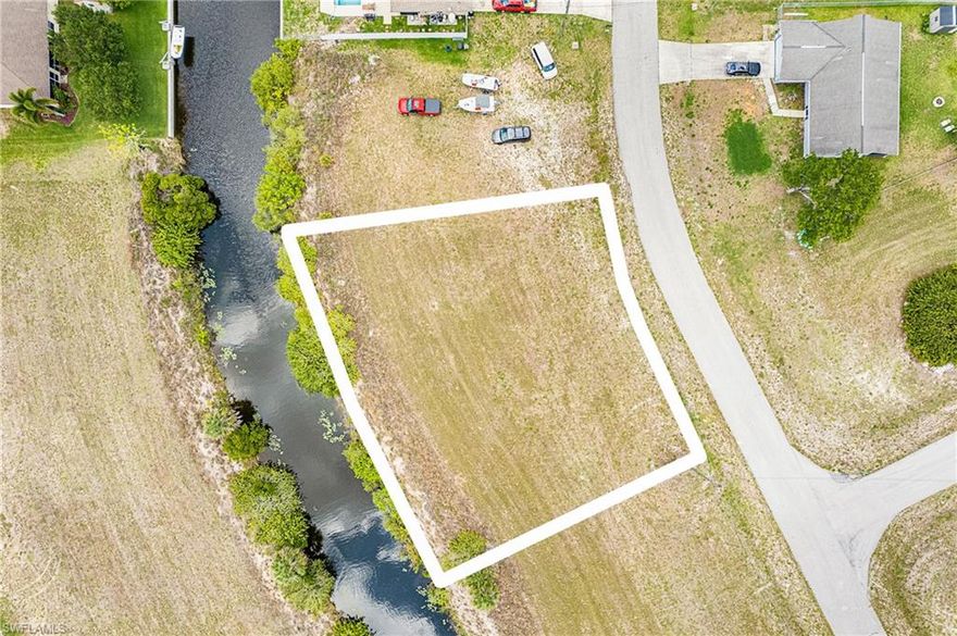 Ready to start your next project? Build your dream home or an investment property on this beautiful oversized lot located on a freshwater canal plus bring your jet ski's and small boat. Freshwater canal leads out to many miles of additional canals and lakes such as Apache Lake, Seminole Lake and Manitoba Lake just to name a few. Centrally located off Del Prado Blvd N & Diplomat Pkwy E and only 1-2 miles away from dining, Northpoint Shopping Center, hospitals and so much more!